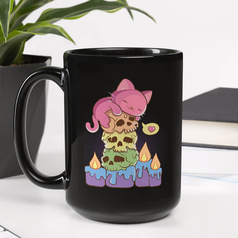 Kawaii Goth Cat on Rainbow Skulls LGBTQ Gay Pride Mug on table
