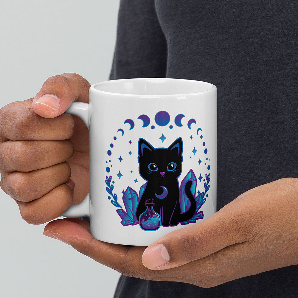 Crystal Alchemy Kawaii Witchy Black Cat Mug in hand