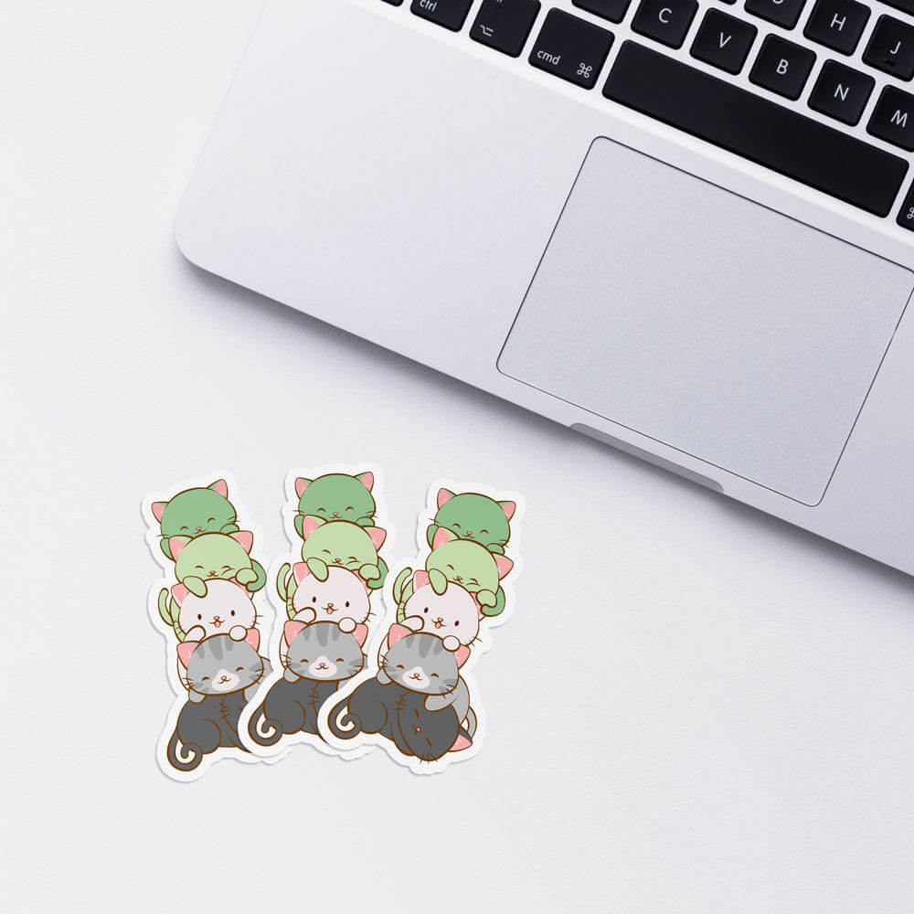 Kawaii Cat Pile Aromantic Pride Stickers with laptop