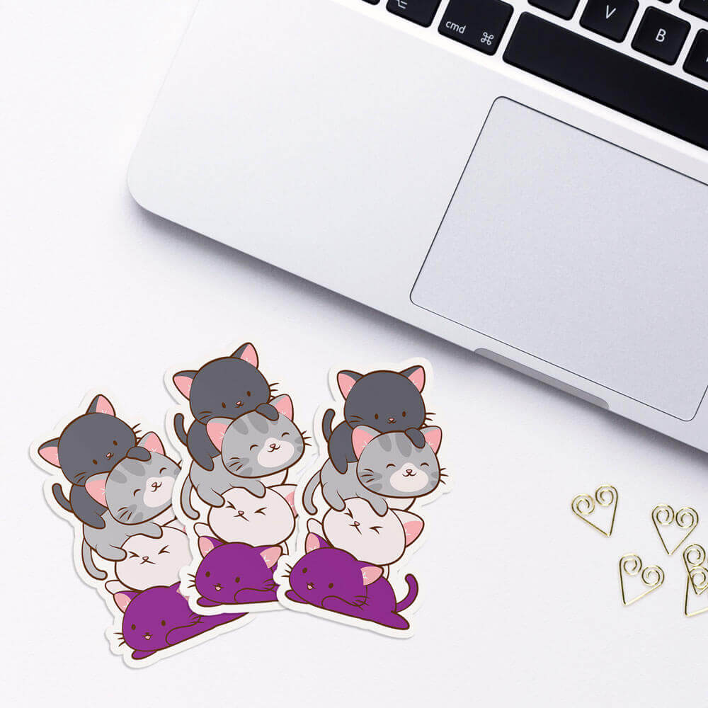 Kawaii Cat Pile Asexual Stickers with laptop