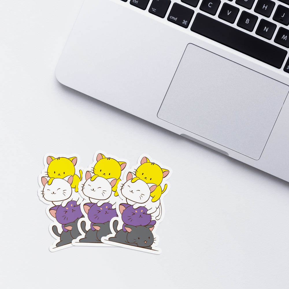 Kawaii Cat Pile Nonbinary Stickers with laptop