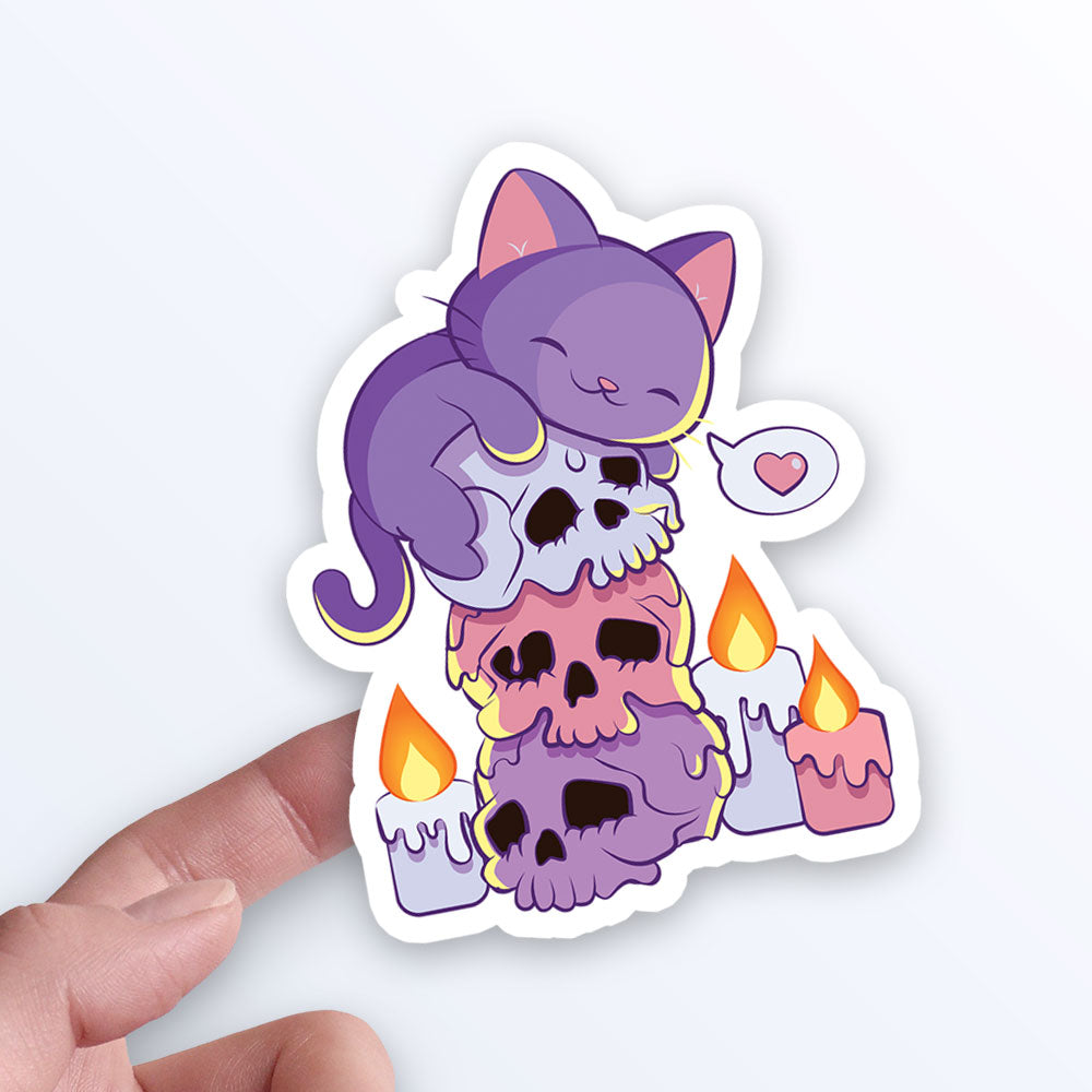 Kitty Cat on Skulls Pastel Goth Aesthetic Cute Kawaii Sticker on hand